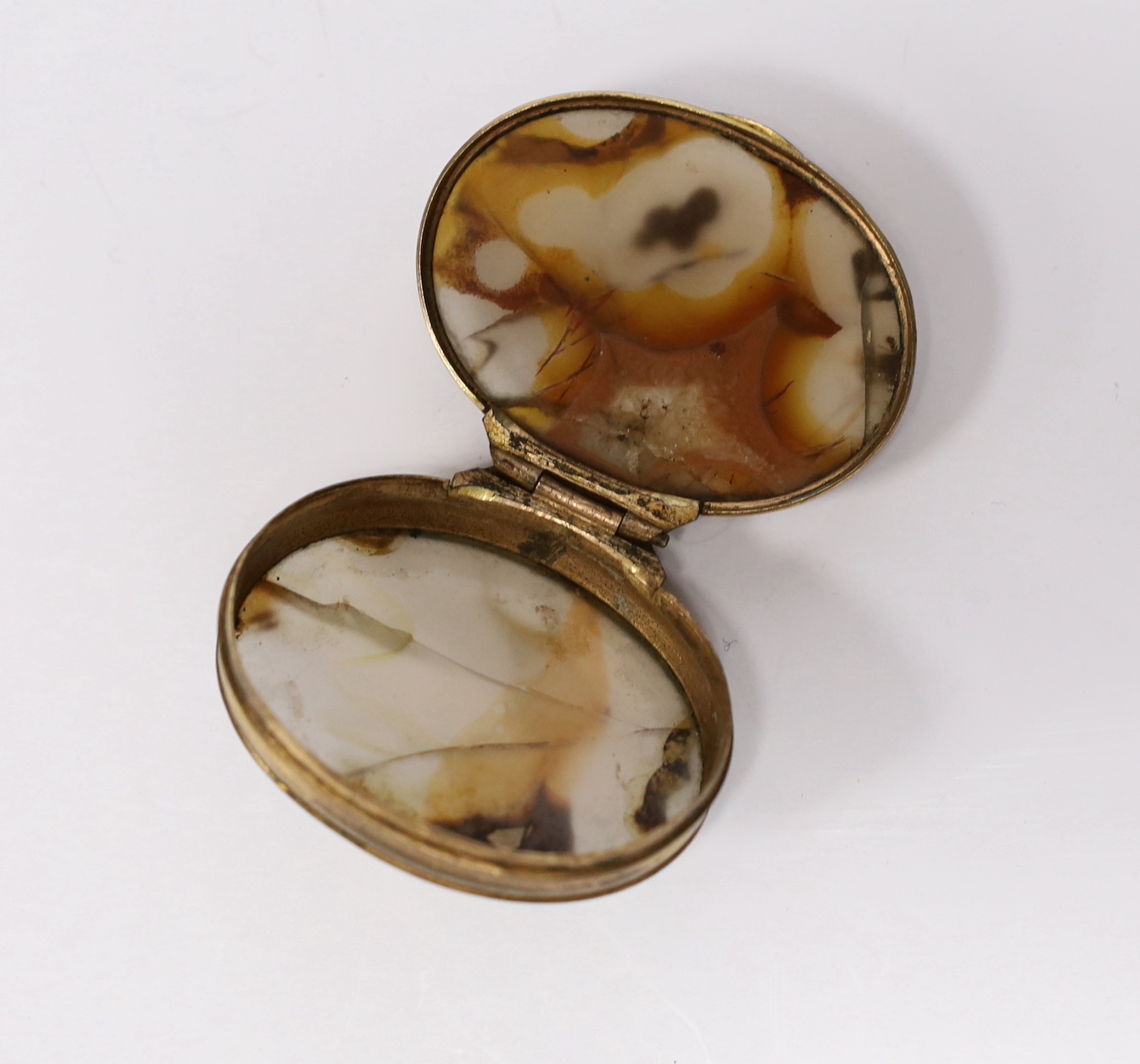 Two boxes comprising agate and a gilt metal example with inset portrait of a lady together with a cased DuPont lighter